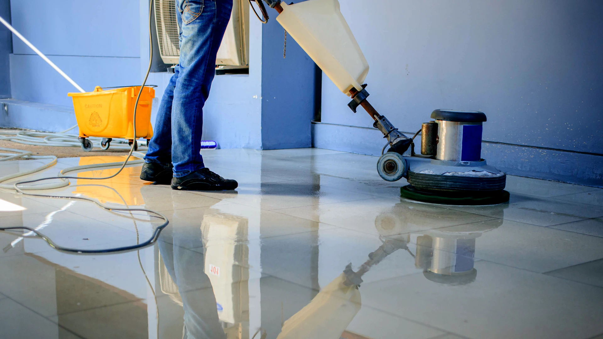 cleaning contractor cleaning a buildings floor sewell nj